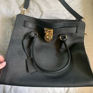 Black and gold Michael Kors Purse
